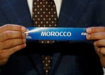 Soccer Football - 2018 FIFA World Cup Draw - State Kremlin Palace, Moscow, Russia - December 1, 2017   Morocco are pulled out during the draw   REUTERS/Kai Pfaffenbach - RC13152EA950