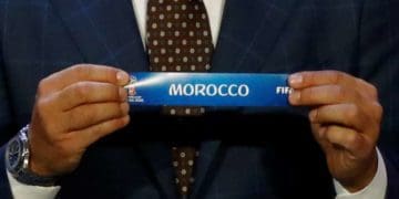 Soccer Football - 2018 FIFA World Cup Draw - State Kremlin Palace, Moscow, Russia - December 1, 2017   Morocco are pulled out during the draw   REUTERS/Kai Pfaffenbach - RC13152EA950