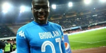 Kalidou Koulibaly of Napoli celebrates with a shirt in honor of Faouzi Ghoulam injured  after the serie A match between SSC Napoli and SS Lazio at Stadio San Paolo on February 10, 2018 in Naples, Italy. (Photo by Matteo Ciambelli/NurPhoto via Getty Images)