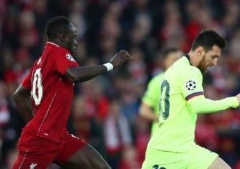 LIVERPOOL, ENGLAND - MAY 07:  Lionel Messi of Barcelona is chased by Sadio Mane of Liverpool during the UEFA Champions League Semi Final second leg match between Liverpool and Barcelona at Anfield on May 07, 2019 in Liverpool, England. (Photo by Clive Brunskill/Getty Images)