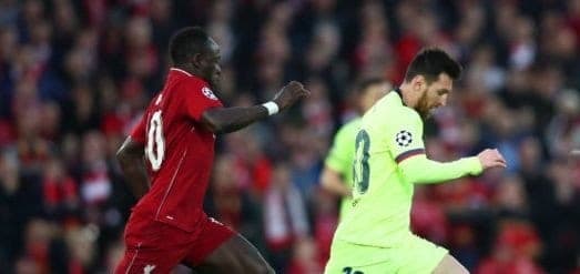 LIVERPOOL, ENGLAND - MAY 07:  Lionel Messi of Barcelona is chased by Sadio Mane of Liverpool during the UEFA Champions League Semi Final second leg match between Liverpool and Barcelona at Anfield on May 07, 2019 in Liverpool, England. (Photo by Clive Brunskill/Getty Images)
