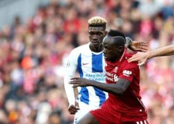 LIVERPOOL, ENGLAND - AUGUST 25:  Yves Bissouma of Brighton and Hove Albion and Davy Proepper of Brighton and Hove Albion battles for posession with Sadio Mane of Liverpool during the Premier League match between Liverpool FC and Brighton & Hove Albion at Anfield on August 25, 2018 in Liverpool, United Kingdom.  (Photo by Jan Kruger/Getty Images)