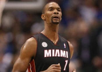 DALLAS, TX - DECEMBER 20:  Chris Bosh #1 of the Miami Heat at American Airlines Center on December 20, 2012 in Dallas, Texas.  NOTE TO USER: User expressly acknowledges and agrees that, by downloading and or using this photograph, User is consenting to the terms and conditions of the Getty Images License Agreement.  (Photo by Ronald Martinez/Getty Images)