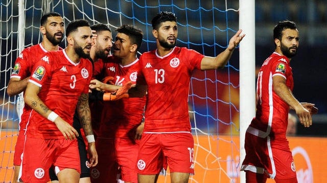 Tunisia players celebrate after Hassen Mouez of Tunisia saves a penalty during the Africa Cup of Nations 2019 Finals semifinal game between Senegal and Tunisia at 30 June Stadium in Cairo, Egypt on 14 July 2019 Photo : PA Images / Icon Sport