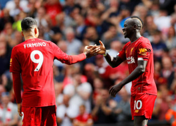 Soccer Football - Premier League - Liverpool v Newcastle United - Anfield, Liverpool, Britain - September 14, 2019  Liverpool's Sadio Mane celebrates scoring their second goal with teammate Roberto Firmino   REUTERS/Phil Noble  EDITORIAL USE ONLY. No use with unauthorized audio, video, data, fixture lists, club/league logos or "live" services. Online in-match use limited to 75 images, no video emulation. No use in betting, games or single club/league/player publications.  Please contact your account representative for further details.