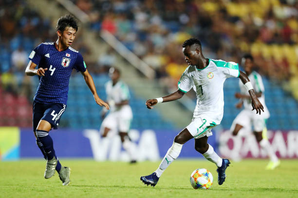 VITORIA, BRAZIL - NOVEMBER 02: Shinya Nakano of Japan defends Aliou Balde of Senegal during the FIFA U-17 World Cup Brazil 2019 group D match between Senegal and Japan at Estádio Kléber Andrade on November 02, 2019 in Vitoria, Brazil. (Photo by Maddie Meyer - FIFA/FIFA via Getty Images)