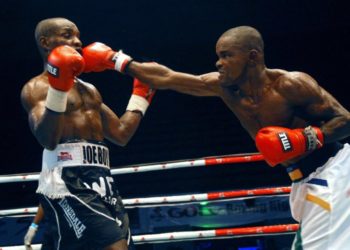 Nigeria's Lion Nwoye (R), aka Prince, competes against Nigeria's Otto Joseph, aka Joe Boy, during the national lightweight challenge fight at the sport hall National Stadium in Lagos, on April 15, 2018.
Boxing used to be the most popular sport in Nigeria until the 1960s but fell out of favour for decades, in part due to lack of sponsorship, until the 2000s. Since then, it has made a come-back and been seen as a way for aspiring boxers from impoverished backgrounds to find fame and fortune. / AFP PHOTO / SEGUN OGUNFEYITIMI