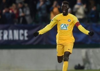 Pau's senegalian Name Moustapha celebrates after scoring a goal during the French Cup football match between FC Pau and Girondins de Bordeaux at the Stade du Hameau Stadium in Pau, southwestern France, on January 16, 2020. (Photo by GAIZKA IROZ / AFP)