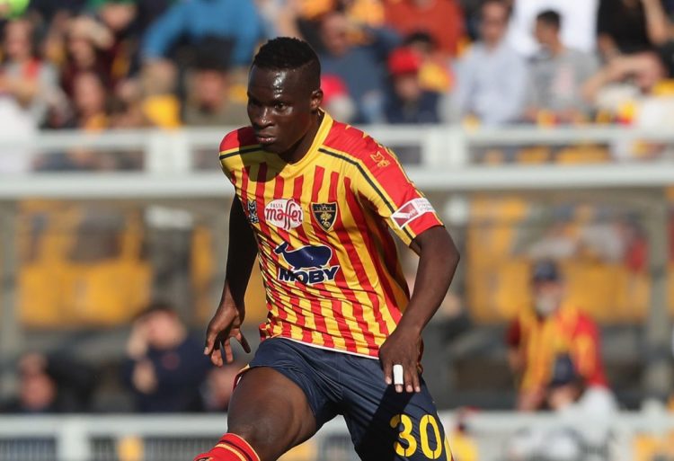 LECCE, ITALY - DECEMBER 08:  Ghouma Babacar of Lecce competes for the ball with Domenico Criscito of Genoa during the Serie A match between US Lecce and Genoa CFC at Stadio Via del Mare on December 8, 2019 in Lecce, Italy.  (Photo by Maurizio Lagana/Getty Images)