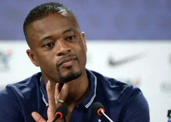 France's defender Patrice Evra gives a press conference in Ribeirao Preto on June 18, 2014 during the 2014 FIFA World Cup in Brazil. AFP PHOTO / FRANCK FIFE (Photo by FRANCK FIFE / AFP)