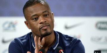 France's defender Patrice Evra gives a press conference in Ribeirao Preto on June 18, 2014 during the 2014 FIFA World Cup in Brazil. AFP PHOTO / FRANCK FIFE (Photo by FRANCK FIFE / AFP)