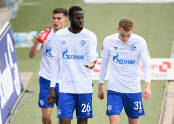 FREIBURG IM BREISGAU, GERMANY - APRIL 17: Salif Sane and Timo Becker of FC Schalke 04  look dejected after the Bundesliga match between Sport-Club Freiburg and FC Schalke 04 at Schwarzwald-Stadion on April 17, 2021 in Freiburg im Breisgau, Germany. Sporting stadiums around Germany remain under strict restrictions due to the Coronavirus Pandemic as Government social distancing laws prohibit fans inside venues resulting in games being played behind closed doors. (Photo by Matthias Hangst/Getty Images)