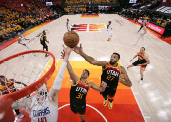 SALT LAKE CITY, UT - JUNE 8: Rudy Gobert #27 of the Utah Jazz and Georges Niang #31 of the Utah Jazz fight for the rebound during the game against the LA Clippers during Round 2, Game 1 of the 2021 NBA Playoffs on June 8, 2021 at vivint.SmartHome Arena in Salt Lake City, Utah. NOTE TO USER: User expressly acknowledges and agrees that, by downloading and or using this Photograph, User is consenting to the terms and conditions of the Getty Images License Agreement. Mandatory Copyright Notice: Copyright 2021 NBAE (Photo by Melissa Majchrzak/NBAE via Getty Images)