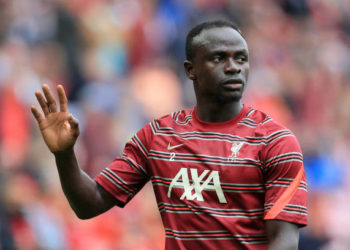 LIVERPOOL, ENGLAND - AUGUST 08: Sadio Mane of Liverpool waves during the warm-up ahead of the pre-season friendly match between Liverpool and Athletic Club at Anfield on August 8, 2021 in Liverpool, England. (Photo by Simon Stacpoole/Offside/Offside via Getty Images)