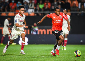Sofiane DIOP of Monaco and Armand LAURIENTE of Lorient durnig the Ligue 1 Uber Eats match between Lorient and Monaco at Stade du Moustoir on August 13, 2021 in Lorient, France. (Photo by Matthieu Mirville/Icon Sport via Getty Images)