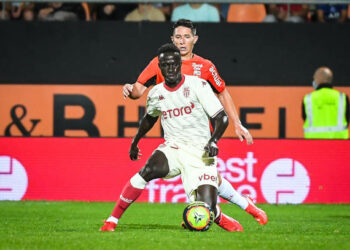 Krepin DIATTA of Monaco and Laurent ABERGEL of Lorient durnig the Ligue 1 Uber Eats match between Lorient and Monaco at Stade du Moustoir on August 13, 2021 in Lorient, France. (Photo by Matthieu Mirville/Icon Sport via Getty Images)