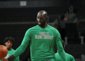 BOSTON, MA - FEBRUARY 19: Tacko Fall #99 of the Boston Celtics smiles before the game against the Atlanta Hawks on February 19, 2021 at the TD Garden in Boston, Massachusetts.  NOTE TO USER: User expressly acknowledges and agrees that, by downloading and or using this photograph, User is consenting to the terms and conditions of the Getty Images License Agreement. Mandatory Copyright Notice: Copyright 2021 NBAE  (Photo by Nathaniel S. Butler/NBAE via Getty Images)
