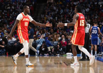 PHILADELPHIA, PA - OCTOBER 30: Gorgui Dieng #10 of the Atlanta Hawks and Clint Capela #15 of the Atlanta Hawks high-five during a game against the Philadelphia 76ers on October 30, 2021 at Wells Fargo Center in Philadelphia, Pennsylvania. NOTE TO USER: User expressly acknowledges and agrees that, by downloading and/or using this Photograph, user is consenting to the terms and conditions of the Getty Images License Agreement. Mandatory Copyright Notice: Copyright 2021 NBAE (Photo by David Dow/NBAE via Getty Images)