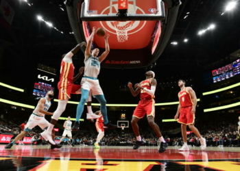 ATLANTA, GA - NOVEMBER 20: Mason Plumlee #24 of the Charlotte Hornets grabs the rebound during the game against the Atlanta Hawks on November 20, 2021 at State Farm Arena in Atlanta, Georgia. NOTE TO USER: User expressly acknowledges and agrees that, by downloading and/or using this Photograph, user is consenting to the terms and conditions of the Getty Images License Agreement. Mandatory Copyright Notice: Copyright 2021 NBAE (Photo by Adam Hagy/NBAE via Getty Images)