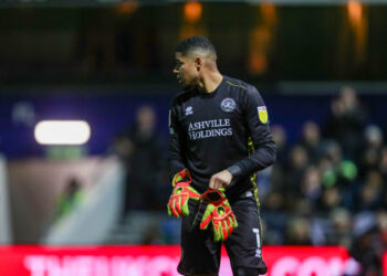 QPRs Seny Dieng changes gloves during the Sky Bet Championship match between Queens Park Rangers and Luton Town at the Kiyan Prince Foundation Stadium., London on Friday 19th November 2021.  (Photo by Ian Randall/MI News/NurPhoto via Getty Images)