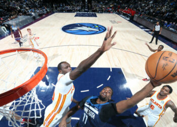 MINNEAPOLIS, MN -  DECEMBER 6: Naz Reid #11 of the Minnesota Timberwolves shoots the ball during the game against the Atlanta Hawks on December 6, 2021 at Target Center in Minneapolis, Minnesota. NOTE TO USER: User expressly acknowledges and agrees that, by downloading and or using this Photograph, user is consenting to the terms and conditions of the Getty Images License Agreement. Mandatory Copyright Notice: Copyright 2021 NBAE (Photo by David Sherman/NBAE via Getty Images)