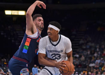MEMPHIS, TENNESSEE - DECEMBER 13: Jarrett Culver #23 of the Memphis Grizzlies goes to the basket against Georges Niang #20 of the Philadelphia 76ers during the second half at FedExForum on December 13, 2021 in Memphis, Tennessee. NOTE TO USER: User expressly acknowledges and agrees that, by downloading and or using this Photograph, user is consenting to the terms and conditions of the Getty Images License Agreement. (Photo by Justin Ford/Getty Images)