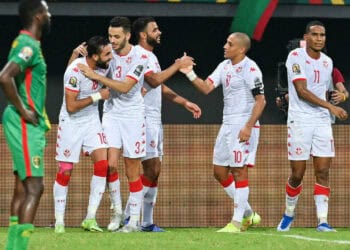 Tunisia's forward Wahbi Khazri (2R) celebrates with teammates after scoring a goal during the Group F Africa Cup of Nations (CAN) 2021 football match between Tunisia and Mauritania at Limbe Omnisport Stadium in Limbe on January 16, 2022. (Photo by Issouf SANOGO / AFP)