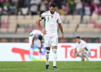Algeria's forward Riyad Mahrez reacts after Ivory Coast's forward Nicolas Pepe (not seen_ scored Ivory Coast's third goal during the Group E Africa Cup of Nations (CAN) 2021 football match between Ivory Coast and Algeria at Stade de Japoma in Douala on January 20, 2022. (Photo by CHARLY TRIBALLEAU / AFP)