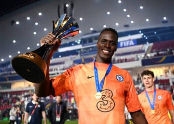 ABU DHABI, UNITED ARAB EMIRATES - FEBRUARY 12: Edouard Mendy of Chelsea celebrates with The FIFA Club World Cup trophy following heir side's victory during the FIFA Club World Cup UAE 2021 Final match between Chelsea and Palmeiras at Mohammed Bin Zayed Stadium on February 12, 2022 in Abu Dhabi, United Arab Emirates. (Photo by Michael Regan - FIFA/FIFA via Getty Images)