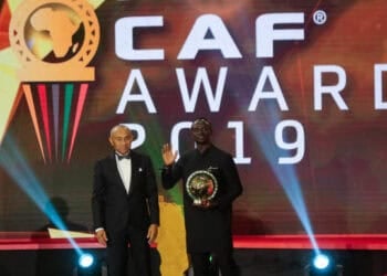 07 January 2020, Egypt, Hurghada: Senegalese footballer Sadio Mane (R) receives the Player of the Year award from CAF President Ahmad Ahmad during the 2019 CAF Awards ceremony at Albatros Citadel. Photo: Ibrahim Youssef/dpa (Photo by Ibrahim Youssef/picture alliance via Getty Images)