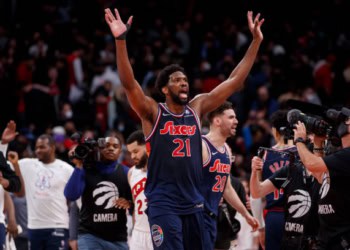 TORONTO, ON - APRIL 20: Joel Embiid #21 of the Philadelphia 76ers waves after defeating the Toronto Raptors in Game Three of the Eastern Conference First Round at Scotiabank Arena on April 20, 2022 in Toronto, Canada. NOTE TO USER: User expressly acknowledges and agrees that, by downloading and or using this Photograph, user is consenting to the terms and conditions of the Getty Images License Agreement. (Photo by Cole Burston/Getty Images)