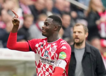 30 April 2022, Rhineland-Palatinate, Mainz: Soccer: Bundesliga, FSV Mainz 05 - Bayern Munich, Matchday 32, Mewa Arena. Mainz Moussa Niakhaté celebrates after the 2:0. Photo: Thomas Frey/dpa - IMPORTANT NOTE: In accordance with the requirements of the DFL Deutsche Fußball Liga and the DFB Deutscher Fußball-Bund, it is prohibited to use or have used photographs taken in the stadium and/or of the match in the form of sequence pictures and/or video-like photo series. (Photo by Thomas Frey/picture alliance via Getty Images)