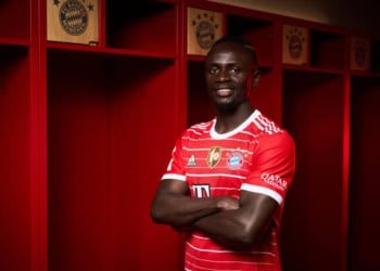 MUNICH, GERMANY - JUNE 22: Sadio Mane poses in the dressing room after his presentation as new player of FC Bayern München at Allianz Arena on June 22, 2022 in Munich, Germany.  (Photo by S. Mellar/FC Bayern via Getty Images)