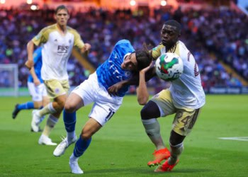 STOCKPORT, ENGLAND - AUGUST 23: Oliver Crankshaw of Stockport County battles for possession with Nampalys Mendy of Leicester City during the Carabao Cup Second Round match between Stockport County and Leicester City at Edgeley Park on August 23, 2022 in Stockport, England. (Photo by James Gill - Danehouse/Getty Images)