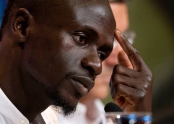 22 June 2022, Bavaria, Munich: Soccer: Bundesliga, presentation of Sadio Mane at the Allianz Arena, Sadio Mane takes part in the press conference. After reaching an agreement with Liverpool FC, the 30-year-old goal scorer signed a three-year contract with the German soccer record champion until June 30, 2025. Photo: Sven Hoppe/dpa (Photo by Sven Hoppe/picture alliance via Getty Images)