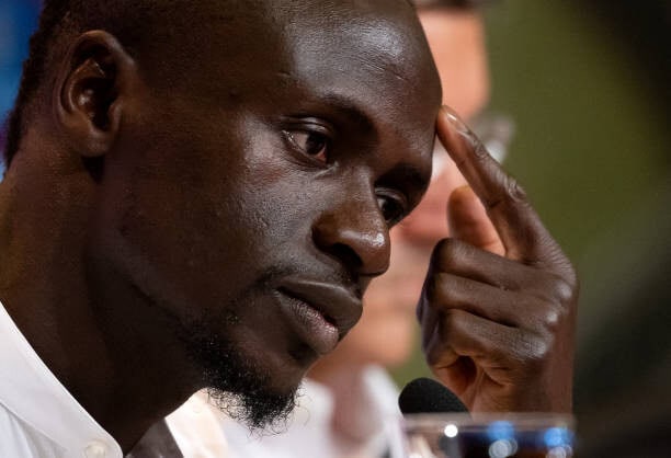 Sadio Mané : "Bambali a fait de moi ce que je suis, il est important pour moi de donner quelque chose en retour" - wiwsport 22 June 2022, Bavaria, Munich: Soccer: Bundesliga, presentation of Sadio Mane at the Allianz Arena, Sadio Mane takes part in the press conference. After reaching an agreement with Liverpool FC, the 30-year-old goal scorer signed a three-year contract with the German soccer record champion until June 30, 2025. Photo: Sven Hoppe/dpa (Photo by Sven Hoppe/picture alliance via Getty Images)