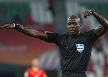 Senegalese referee Maguette Ndiaye gestures during the FIFA Club World Cup 3rd place football match between Egypt's Al-Ahly vs Brazil's Palmeiras at the Education City Stadium in the Qatari city of Ar-Rayyan on February 11, 2021. (Photo by Karim JAAFAR / AFP) (Photo by KARIM JAAFAR/AFP via Getty Images)