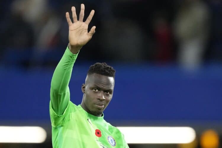 Chelsea's goalkeeper Edouard Mendy greets supporters at the end of the English Premier League soccer match between Chelsea and Burnley at the Stamford Bridge stadium in London, Saturday, Nov. 6, 2021. (AP Photo/Frank Augstein)
