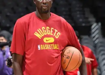 LOS ANGELES, CA - OCTOBER 4: Player Development Coach, Boniface NDong of the Denver Nuggets looks on before the game against the LA Clippers on October 4, 2021, 2021 at STAPLES Center in Los Angeles, California. NOTE TO USER: User expressly acknowledges and agrees that, by downloading and/or using this Photograph, user is consenting to the terms and conditions of the Getty Images License Agreement. Mandatory Copyright Notice: Copyright 2021 NBAE (Photo by Andrew D. Bernstein/NBAE via Getty Images)