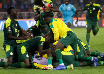 Soccer Football - Africa Cup of Nations - Final - Senegal v Egypt - Olembe Stadium, Yaounde, Cameroon - February 6, 2022 Senegal players celebrate winning the penalty shoot out REUTERS/Mohamed Abd El Ghany