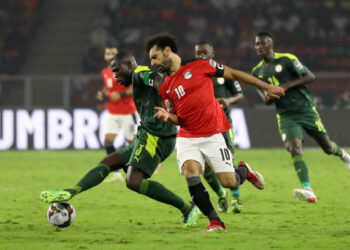 (3) Kalidou Koulibaly (C) of Senegal team battel for the ball with (10) Mohamed Salah (C) of Egypt team during the 2021 Africa Cup of Nations final soccer match between Senegal and Egypt at the Paul Biya 'Olembe' Stadium, Yaounde, Cameroon 06 February 2022. (Photo by Ayman Aref/NurPhoto via Getty Images)