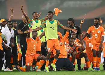 Ivory Coast's players celebrate after winning at the end of the Africa Cup of Nations (CAN) 2024 semi-final football match between Ivory Coast and Democratic Repuplic of Congo at Alassane Ouattara Olympic Stadium in Ebimpe, Abidjan on February 7, 2024. (Photo by FRANCK FIFE / AFP)