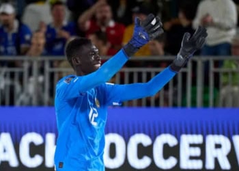 DUBAI, UNITED ARAB EMIRATES - FEBRUARY 18: Ousseynou Faye of Senegal celebrates after scoring goal  during the FIFA Beach Soccer World Cup UAE 2024 Group  C match between Senegal and Colombia at Dubai Design District Stadium on February 18, 2024 in Dubai, United Arab Emirates. (Photo by Aitor Alcalde - FIFA/FIFA via Getty Images)