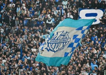 MARSEILLE, FRANCE - MARCH 31 Fans of OM during the Ligue 1 Uber Eats match between Olympique de Marseille and Paris Saint-Germain at Orange Velodrome on March 31, 2024 in Marseille, France.(Photo by Christian Liewig - Corbis/Corbis via Getty Images)