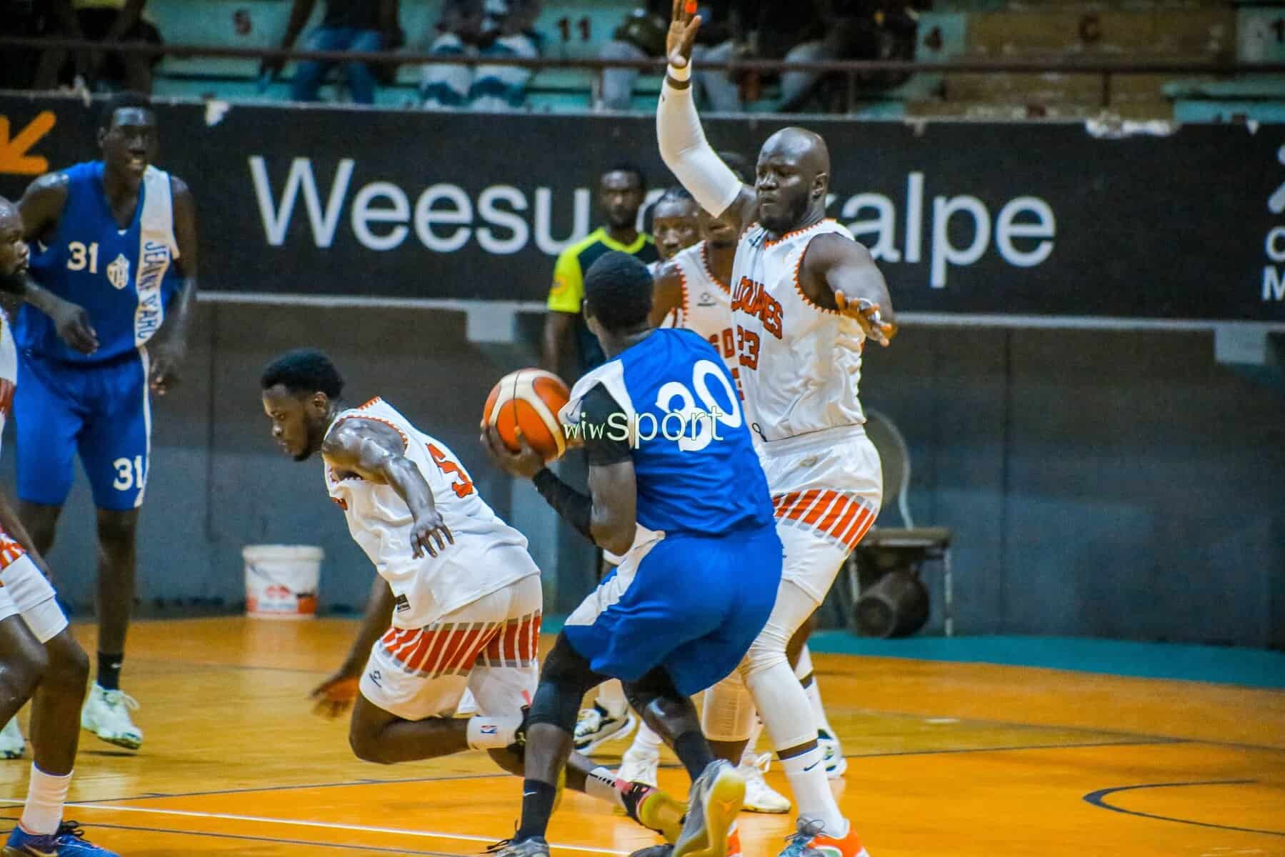 Tout en images : Plongez dans les moments clés de la victoire de l'AS Douanes sur la JA (80-73) - wiwsport Tout en images : Plongez dans les moments clés de la victoire de l'AS Douanes sur la JA (80-73) - wiwsport