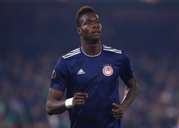 SEVILLE, SPAIN - NOVEMBER 29: Pape Abou Cisse of Olympiacos FC reacts during the UEFA Europa League Group F match between Real Betis Balompie and Olympiacos FC at Estadio Benito Villamarin on November 29, 2018 in Seville, Spain.  (Photo by Aitor Alcalde Colomer/Getty Images)
