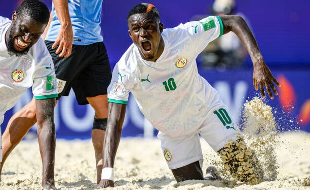 CAN Beach Soccer 2024 - Le tirage au sort aura lieu ce 19 septembre ! - wiwsport MOSCOW, RUSSIA - AUGUST 20: Mamour Diagne of Senegal celebrates after scoring a goal during the FIFA Beach Soccer World Cup 2021 group D match between Senegal and Uruguay at Luzhniki Beach Soccer Stadium on August 20, 2021 in Moscow, Russia. (Photo by Octavio Passos - FIFA/FIFA via Getty Images)