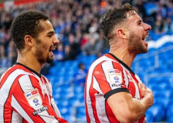 CARDIFF, WALES - NOVEMBER 12: George Baldock (R) of Sheffield United celebrates scoring with Iliman Ndiaye (L) during the Sky Bet Championship match between Cardiff City and Sheffield United at the Cardiff City Stadium on November 12, 2022 in Cardiff, Wales. (Photo by Athena Pictures/Getty Images)