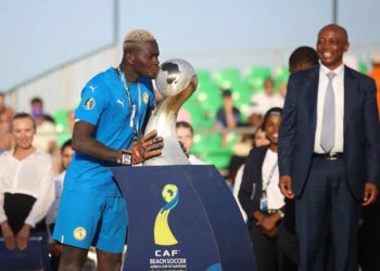CAF President Patrice Motsepe hands over  trophy  during the 2024 Beach Soccer Africa Cup of Nations Final Match between Senegal and Mauritania  in Hurghada BS Arena, Egypt on 26 October 2024 ©Weam Mostafa/BackpagePix