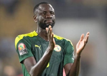 YAOUNDE, CAMEROON - JANUARY 30: CHEIKHOU KOUYATÉ of Senegal celebrates winning the Africa Cup of Nations (CAN) 2021 quarter-final football match between Senegal and Equatorial Guinea at Stade Ahmadou Ahidjo in Yaounde on January 30, 2022. (Photo by Visionhaus/Getty Images)